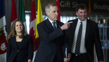 Prime Minister Mark Carney, Minister of Transport and Internal Trade Chrystia Freeland and Minister of International Trade and Intergovernmental Affairs Dominic LeBlanc arrives for the First Ministers meeting at the Canadian War Museum in Ottawa on March 21, 2025. The Hill Times photograph by Andrew Meade