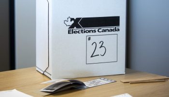 A ballot box and elections paraphernalia are pictured at Chief Electoral Officer of Canada, Stéphane Perrault’s office in Gatineau, Que.  on  April 1, 2025. The Hill Times photograph by Andrew Meade
