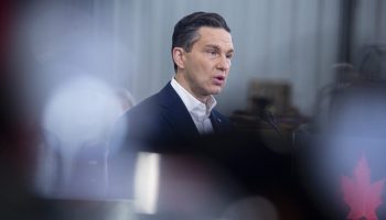 Conservative Party leader Pierre Poilievre makes an announcement on a campaign stop at the Tomlinson Environmental Services shop in Nepean, Ont. on  April 12, 2025. The Hill Times photograph by Andrew Meade