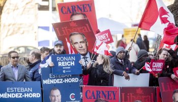 Liberal and Conservative Party supporters gather outside the Federal Leaders debate at La Maison de Radio-Canada in Montréal, Que. on  April 17, 2025.The Hill Times photograph by Andrew Meade
