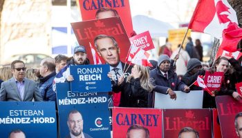 Liberal and Conservative Party supporters gather outside the Federal Leaders debate at La Maison de Radio-Canada in Montréal, Que. on  April 17, 2025.The Hill Times photograph by Andrew Meade
