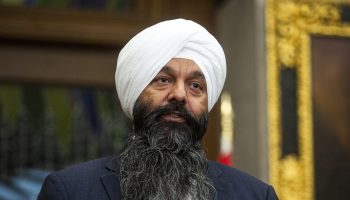 Secretary of State for International Development Randeep Sarai speaks with reporters in the House of Commons foyer before Question Period on  Oct. 30, 2025, about Canada’s aid response to Caribbean nations affected by. Hurricane Melissa. The Hill Times photograph by Andrew Meade