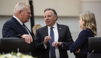 Doug Ford, Premier of Ontario, speaks with Susan Holt, Premier of New Brunswick,  and Francois Legault, Premier of Quebec, before the First Ministers Meeting in Ottawa on Jan. 15, 2025. The Hill Times photograph by Andrew Meade
