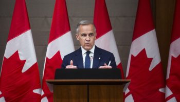 Prime Minister Mark Carney addresses  the Liberal party caucus meeting in West Block  on May 25, 2025. The Hill Times photograph by Andrew Meade