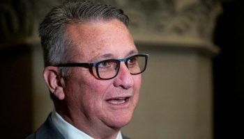 Minister of Agriculture and Agri-Food Heath MacDonald speaks with reporters after the Liberal party caucus meeting from West Block  on May 28, 2025. The Hill Times photograph by Andrew Meade