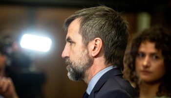 Minister of Canadian Identity and Culture and Minister responsible for Official Languages Steven Guilbeault speaks with reporters before the Liberal cabinet meeting in West Block  on June 10, 2025.