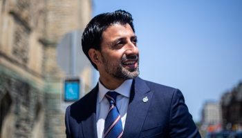 Liberal MP Maninder Sidhu takes questions from reporters outside of West Block before Question Period on  May 18, 2023.