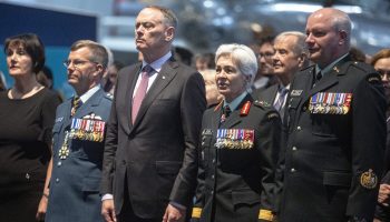 National Defence Minister David McGuinty, centre left, with Chief of Defence Staff Jennie Carignan, centre right. The Hill Times photograph by Andrew Meade