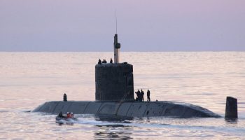 HMCS WINDSOR, a VICTORIA Class submarine exchanges passengers with HMCS FREDERICTON using a Zodiac during Canadian Fleet Operations. HMCS FREDERICTON is participating in the exercise along with other Canadian and American naval vessels. DND photograph by Sgt Roxanne Clowe