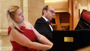 Pianists Mikolaj Warszynski, right, and Zuzana Simurdova play at a concert to mark the Czech Republic’s national day at Knox Presbyterian Church on Oct. 25. The Hill Times photograph by Sam Garcia