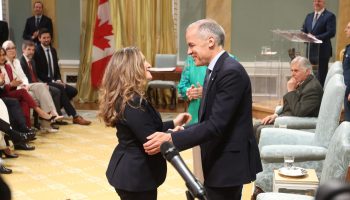 Prime Minister Mark Carney and Transport and Internal Trade Minister Chrystia Freeland at the May 13, 2025 cabinet shuffle at Rideau Hall.