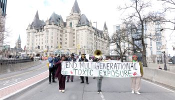 Demonstrators march along Wellington Street on April 21, 2024, before Earth Day to call for the end of plastic pollution. The March to End the Plastic Era comes the week a United Nations negotiating committee on plastic pollution meets in Ottawa for its fourth session.The Hill Times photograph by Sam Garcia