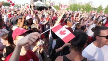 Canada Day 2024, LeBreton Flats and Parliament Hill. Thousands gathered for the evening concert at LeBreton Flats. The Hill Times photograph by Sam Garcia