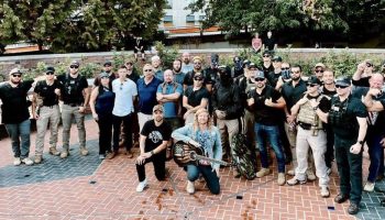 Sean Feucht, middle, poses with members of his security detail ahead of his concert in Portland, Ore., in August 2001, which included several members of The Proud Boys. Photograph courtesy of X