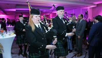 The Sons of Scotland Pipe Band performs for guests at Qatar’s national day reception at the Westin Hotel on Dec. 11, 2024. The Hill Times photograph by Sam Garcia
