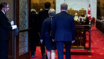 Senators enter the Senate Chamber on May 9, 2023. The Hill Times photograph by Andrew Meade