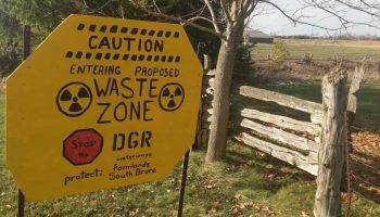 An anti-nuclear sign on a farm in South Bruce, Ont., next to the proposed site of a deep geological repository for high-level nuclear waste. Photograph courtesy of Michelle Stein