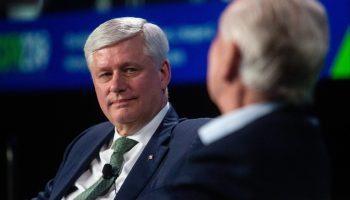 Former Prime Minister Steven Harper and former Reform Party leader Preston Manning have a fireside chat on the opening day of the Canada Strong and Free Networking conference in Ottawa on  March 22, 2023. The Hill Times photograph by Andrew Meade