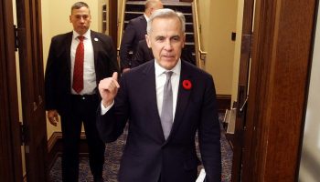 Prime Minister Mark Carney and Minister of Finance heads into the House of Commons to table the budget on Nov. 4, 2025. The Hill Times photograph by Sam Garcia